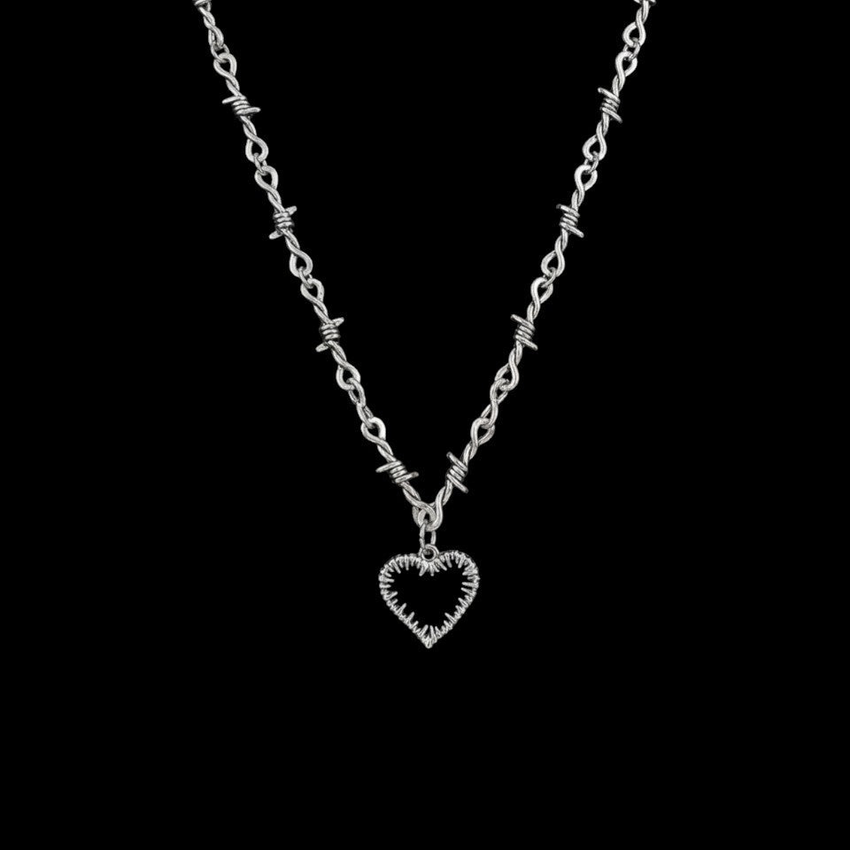 Collar de amor con alambre de púas