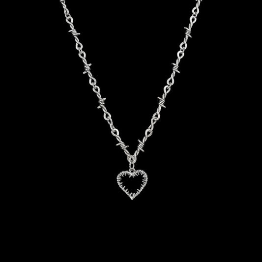 Collar de amor con alambre de púas